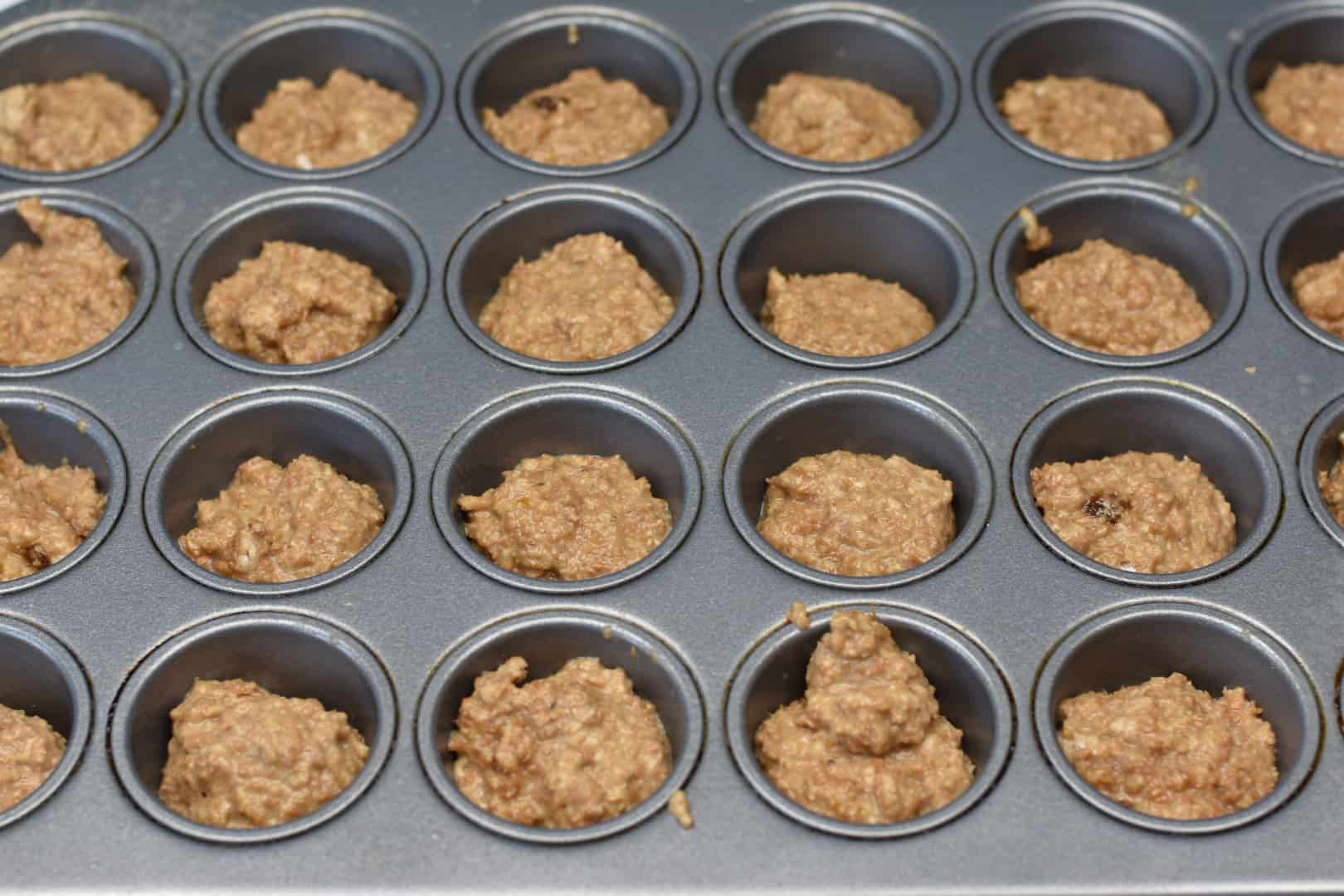 miniature muffin tin with batter