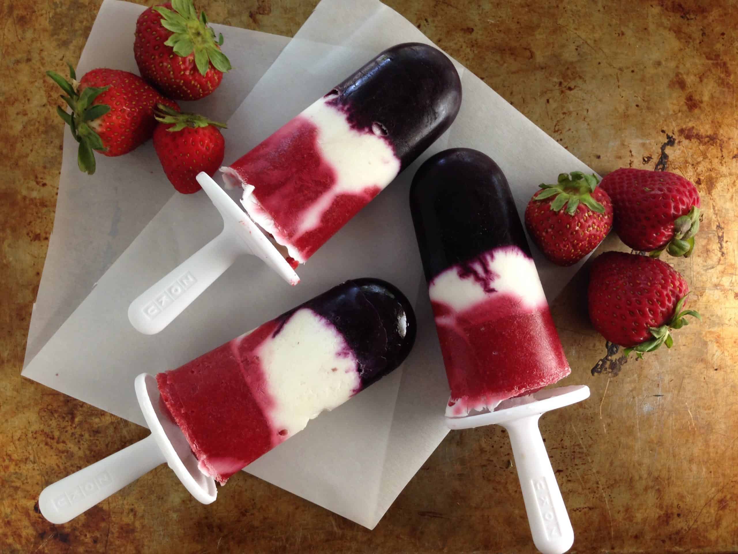 red white and blue popsicles made with Greek yogurt