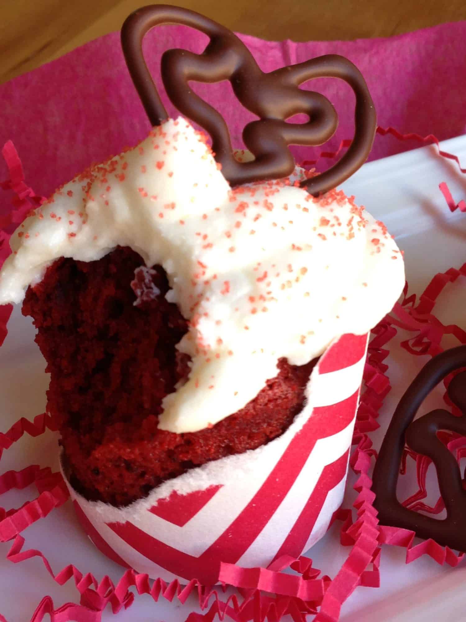 red velvet cupcake with a bite out of it