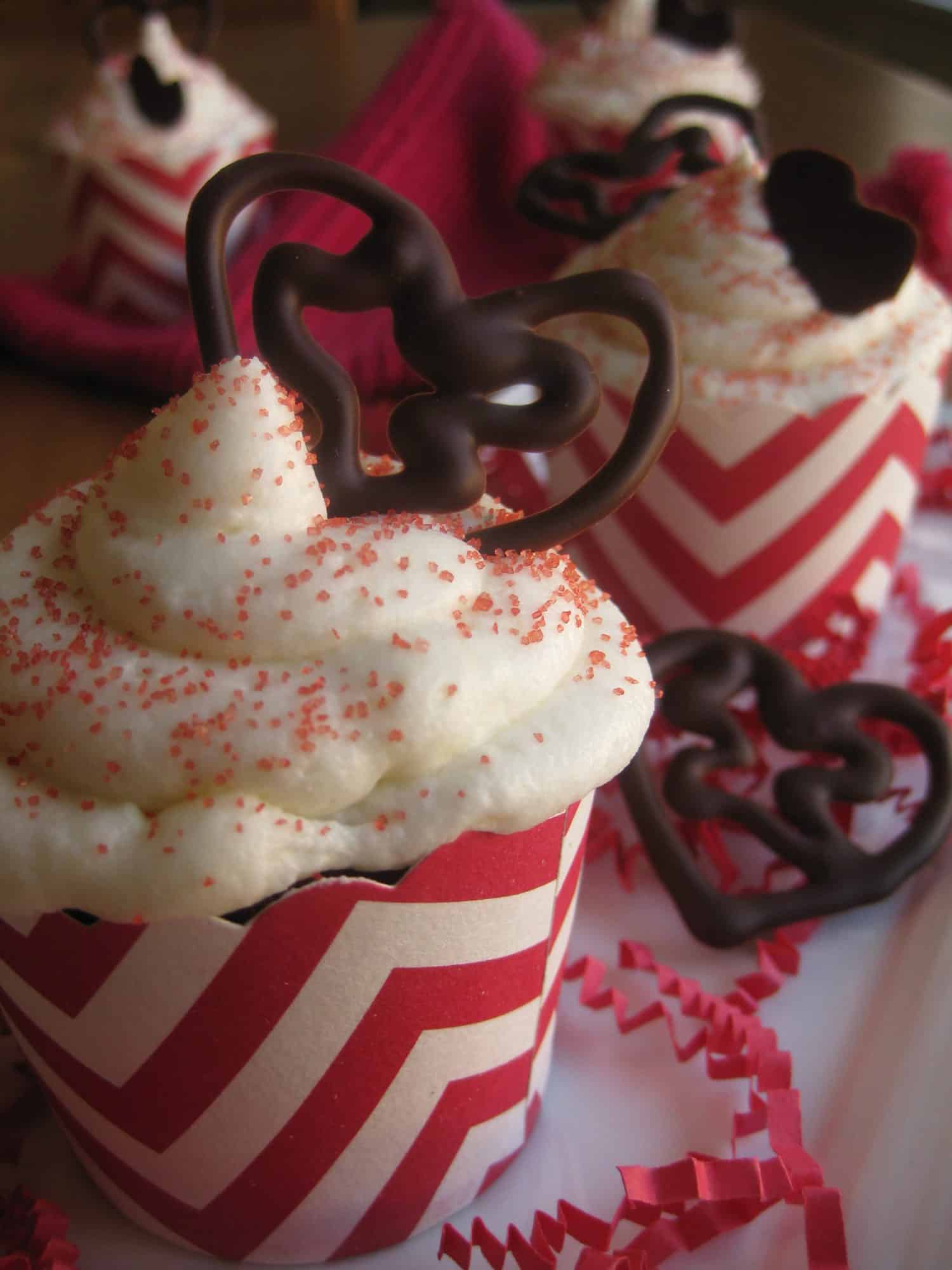closeup of red velvet cupcake with cream cheese frosting