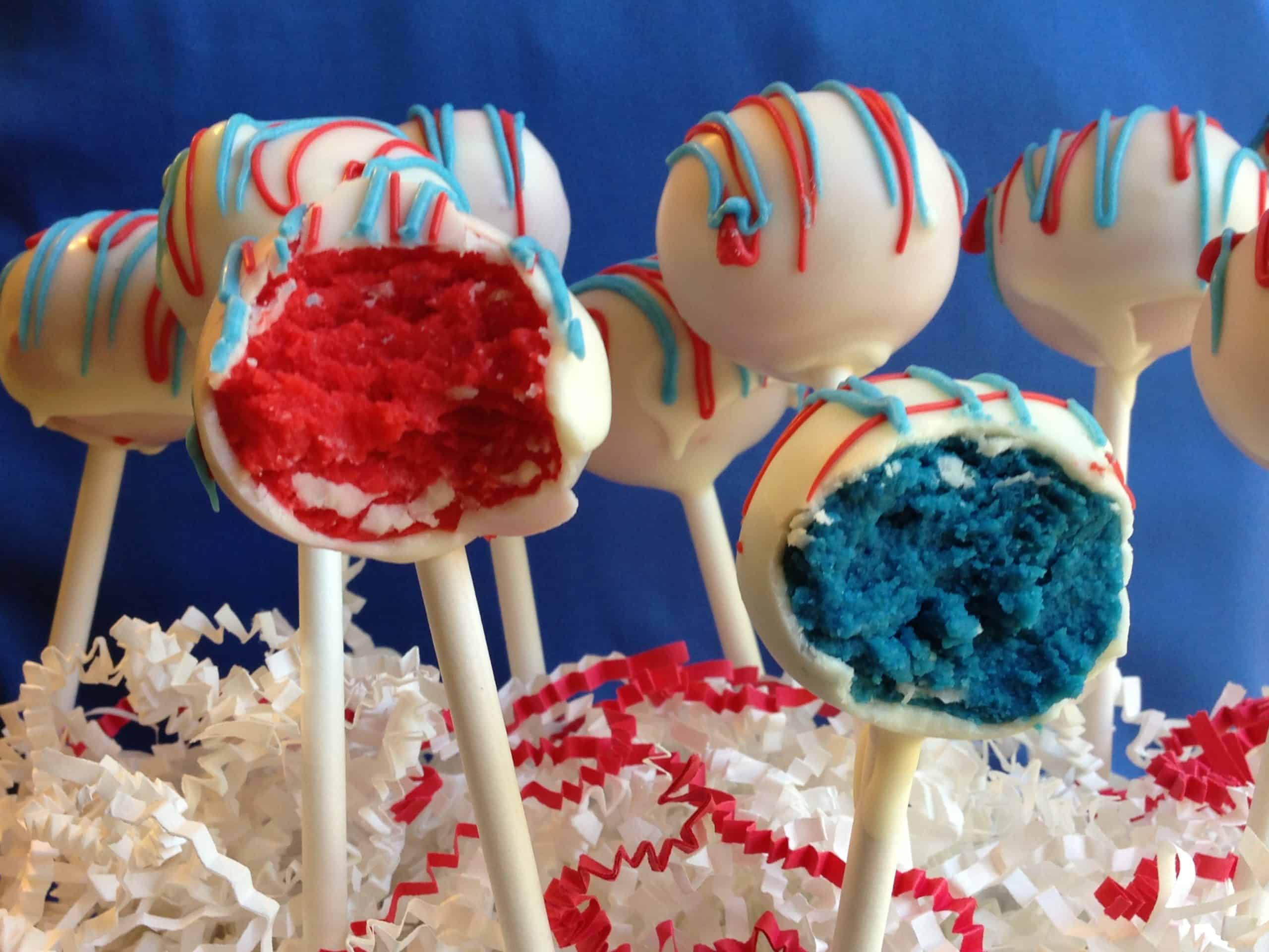 red and blue cake pops with a bite out