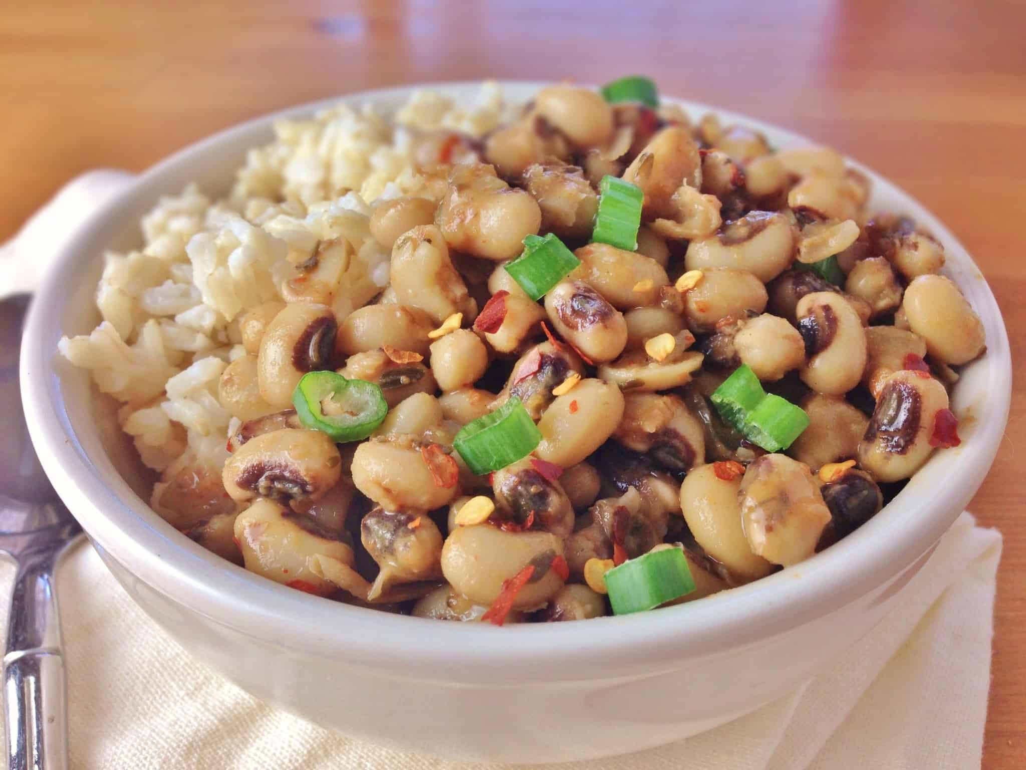 black eyed peas with rice in a white bowl