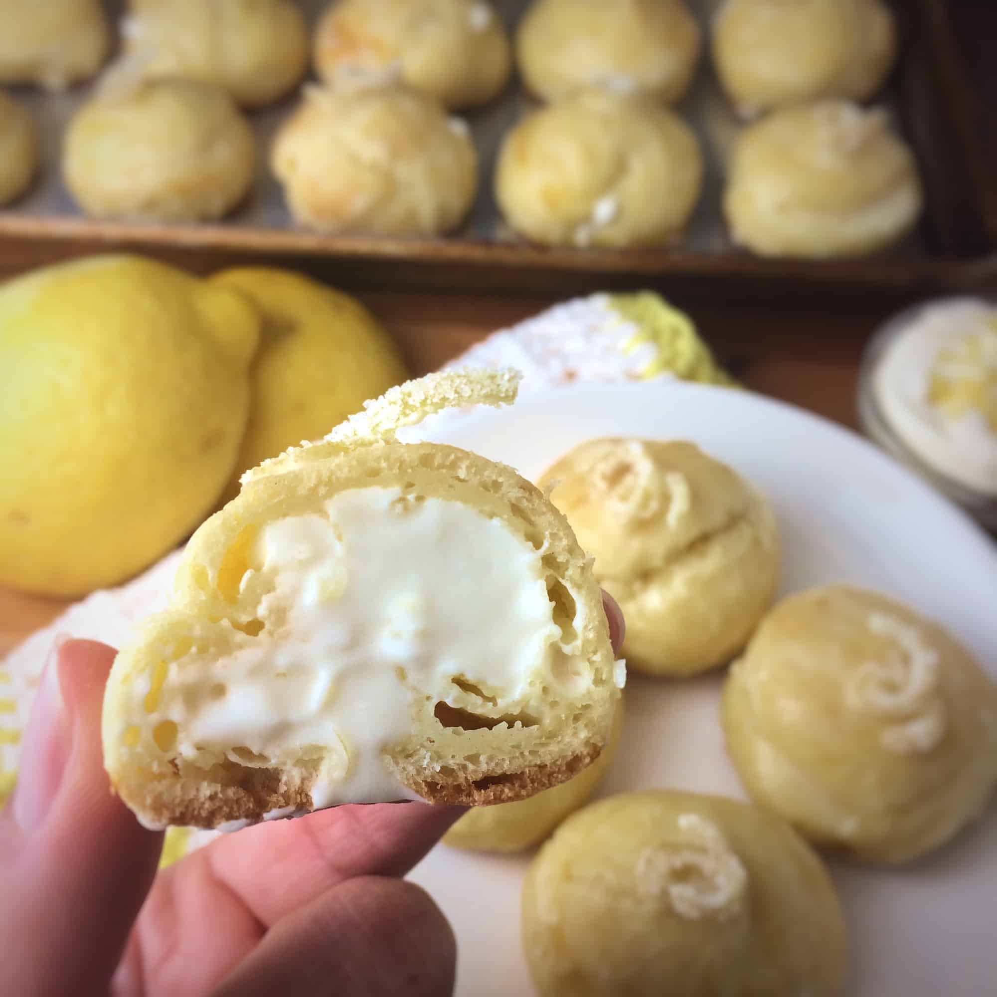 inside of choux bun with lemon curd and whipped cream