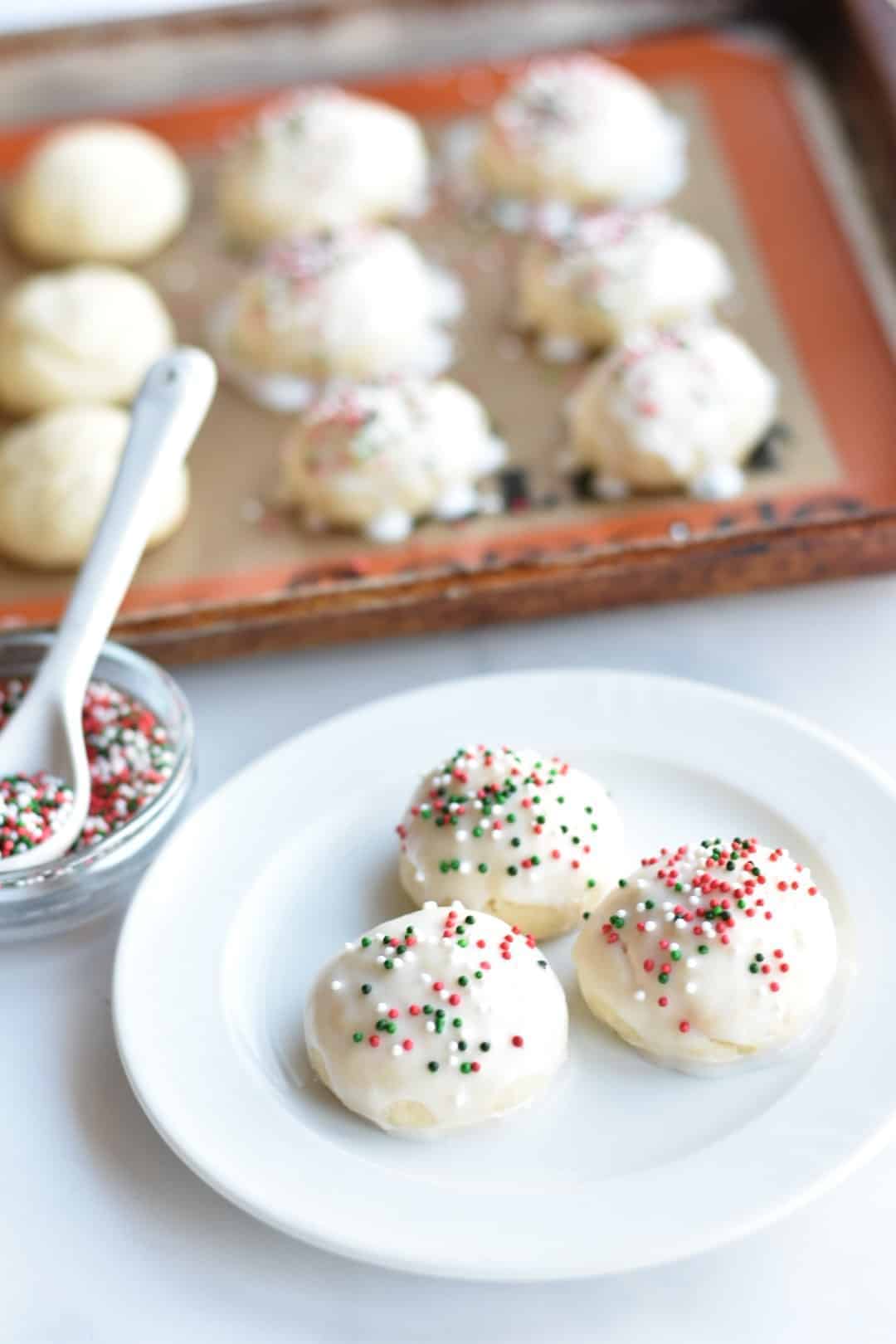 Italian Christmas cookies on a small white plate 