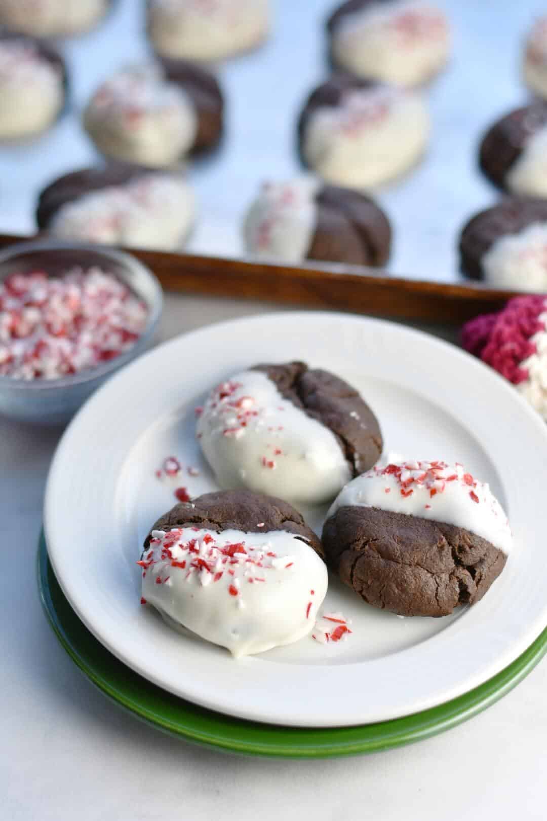 closeup of chocolate candy cane cookies on a plate