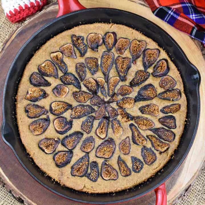 overhead shot of fig cake in a cast-iron skillet.