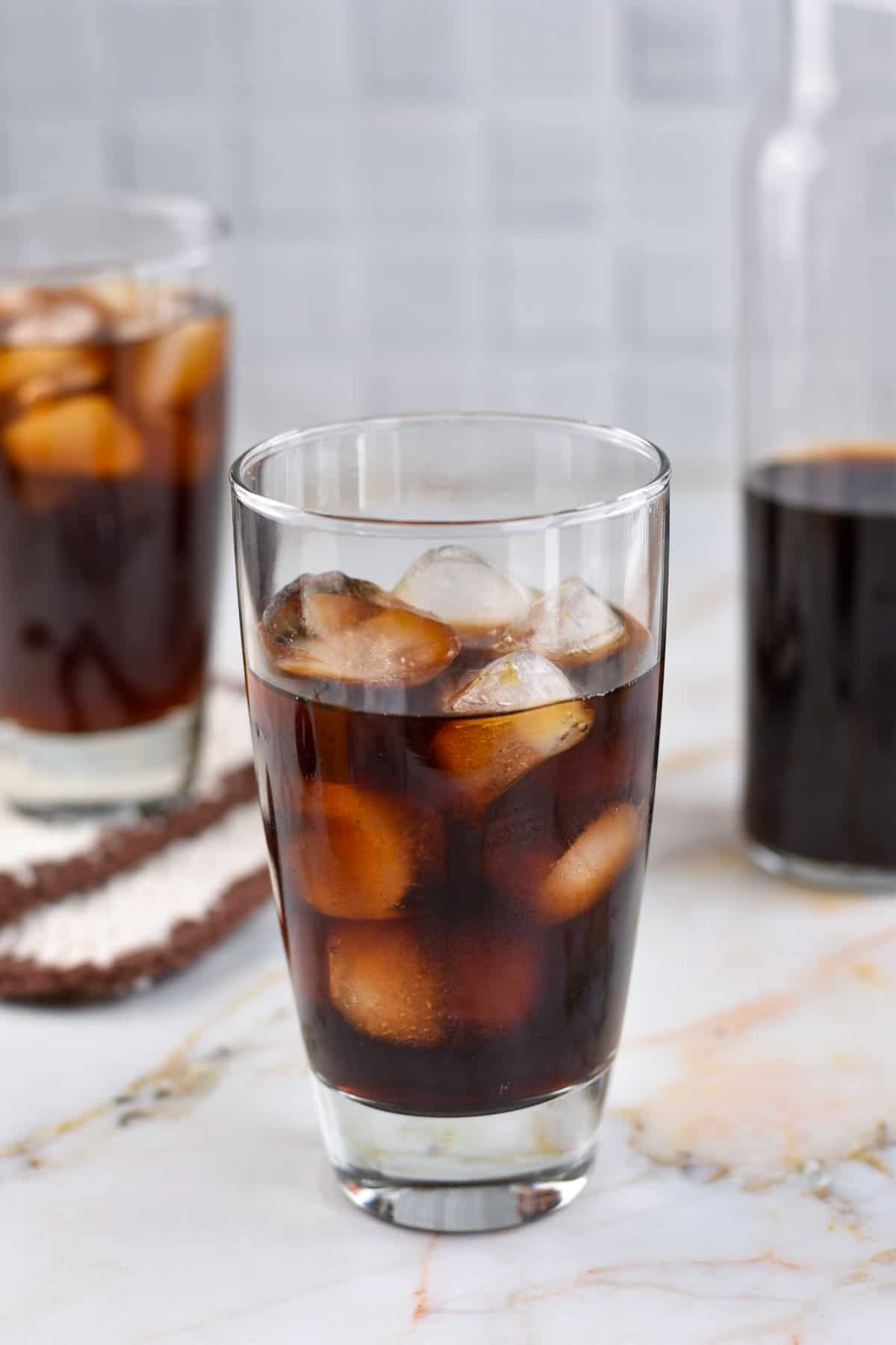 coffee and ice cubes in a clear glass