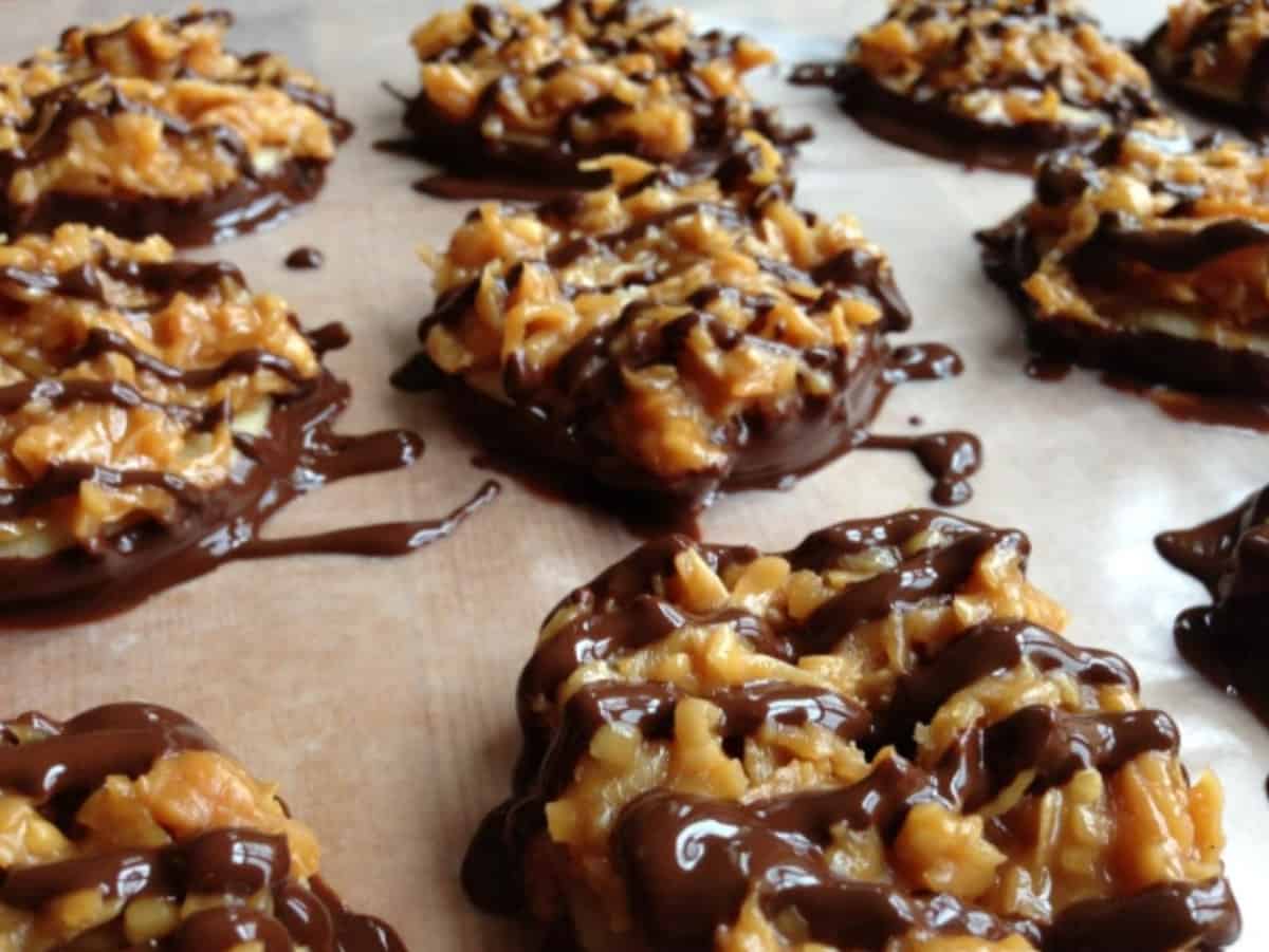 girl scout samoa cookies sitting on cookie sheet