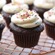 closeup of mini chocolate cupcake with cream cheese frosting