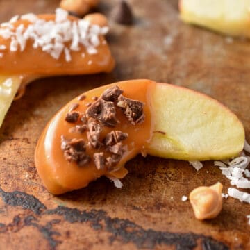 apple slice with caramel and chocolate coating.