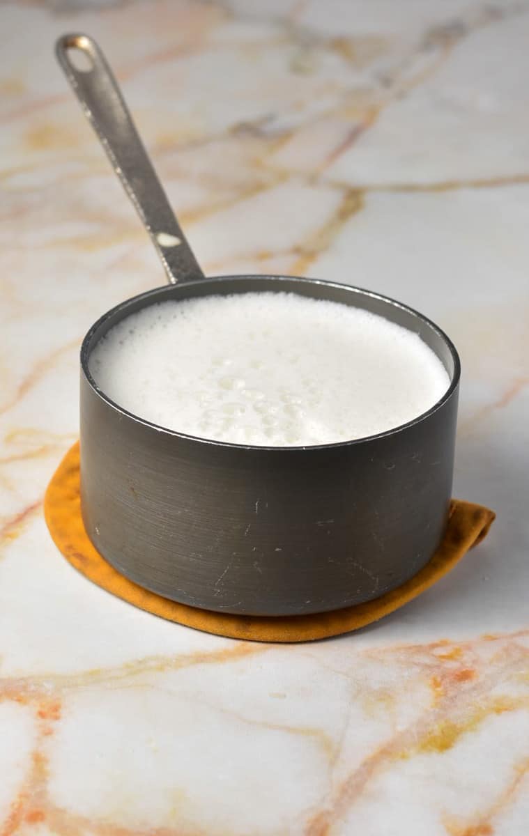 frothed milk in a pan.