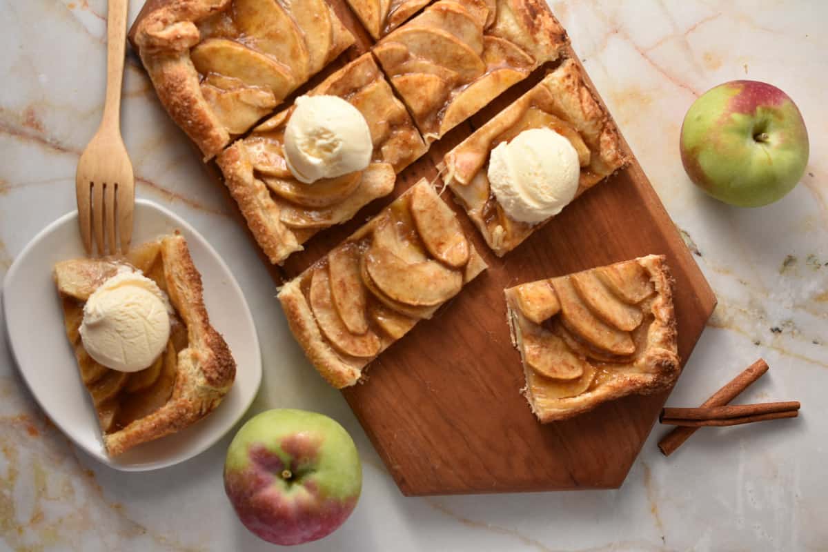overhead shot of apple galette with puff pastry with ice cream.
