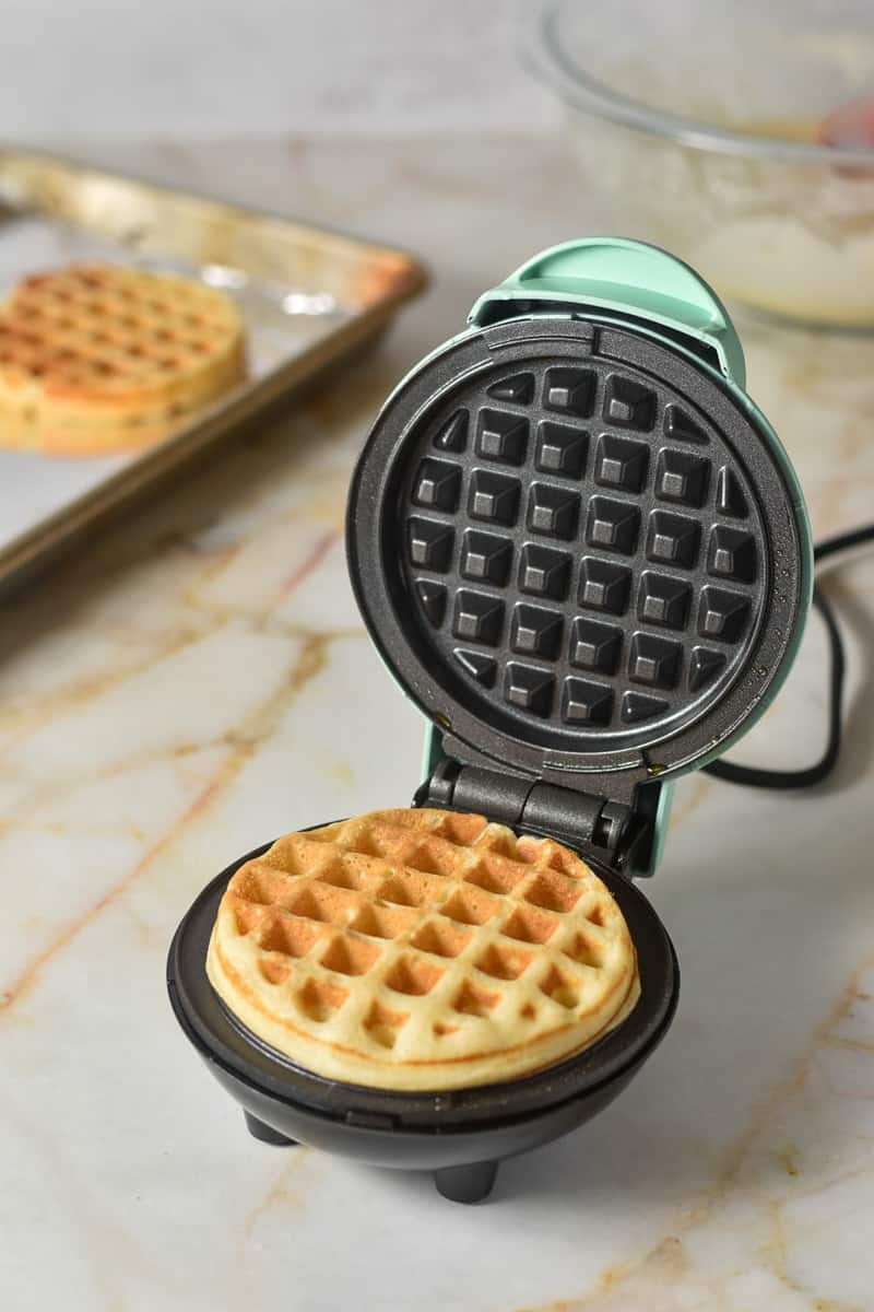 mini waffle maker with waffle inside.