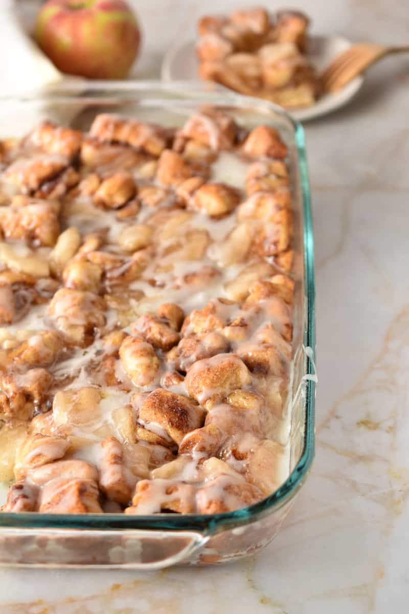 frosting drizzled over apple casserole.