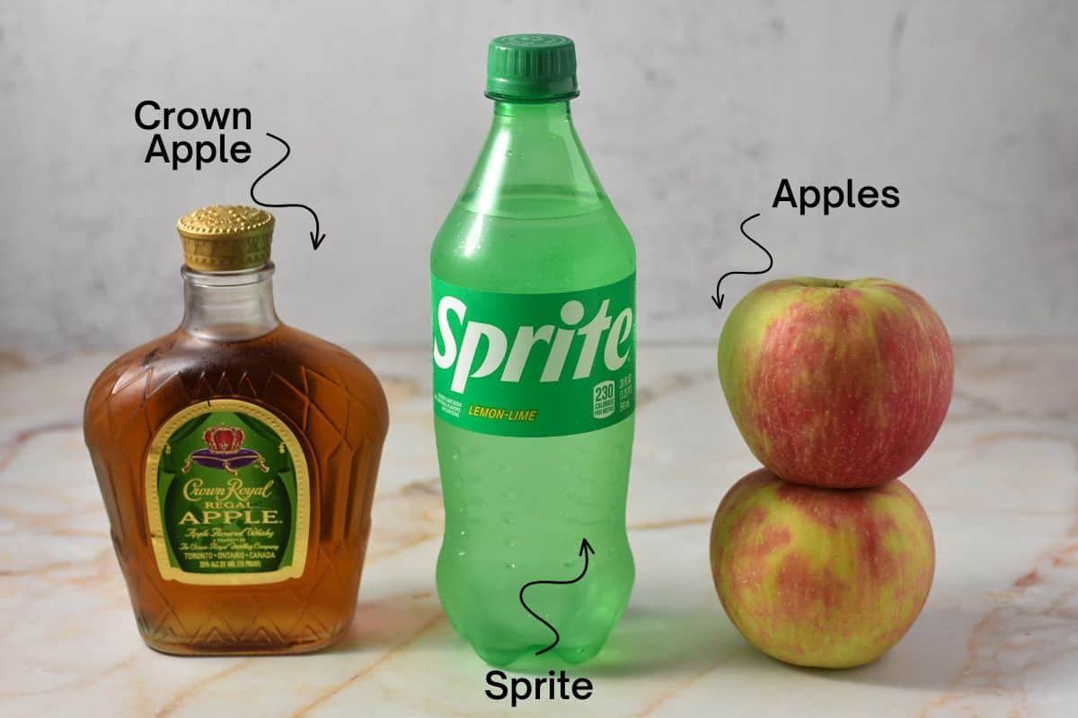crown apple bottle, sprite bottle, and two apples.