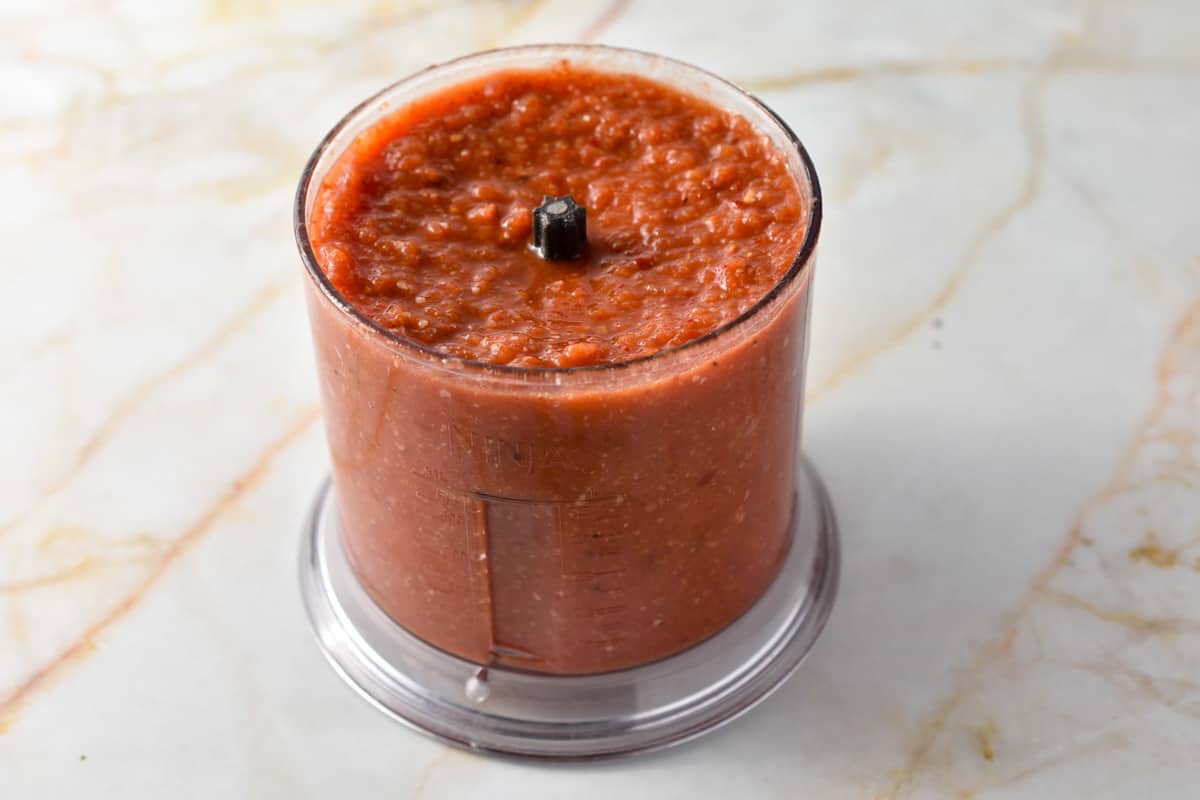 roasted tomatoes and chili peppers in a blender. 