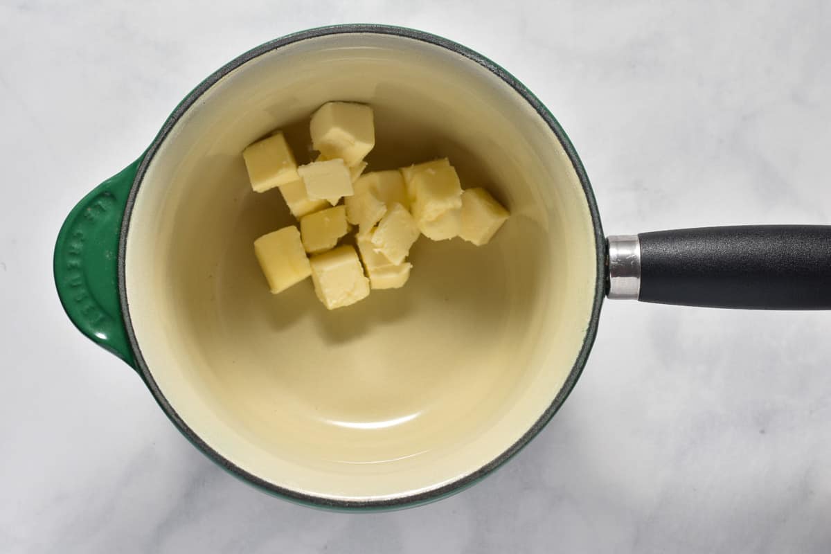 chunks of cubed butter in a pan.