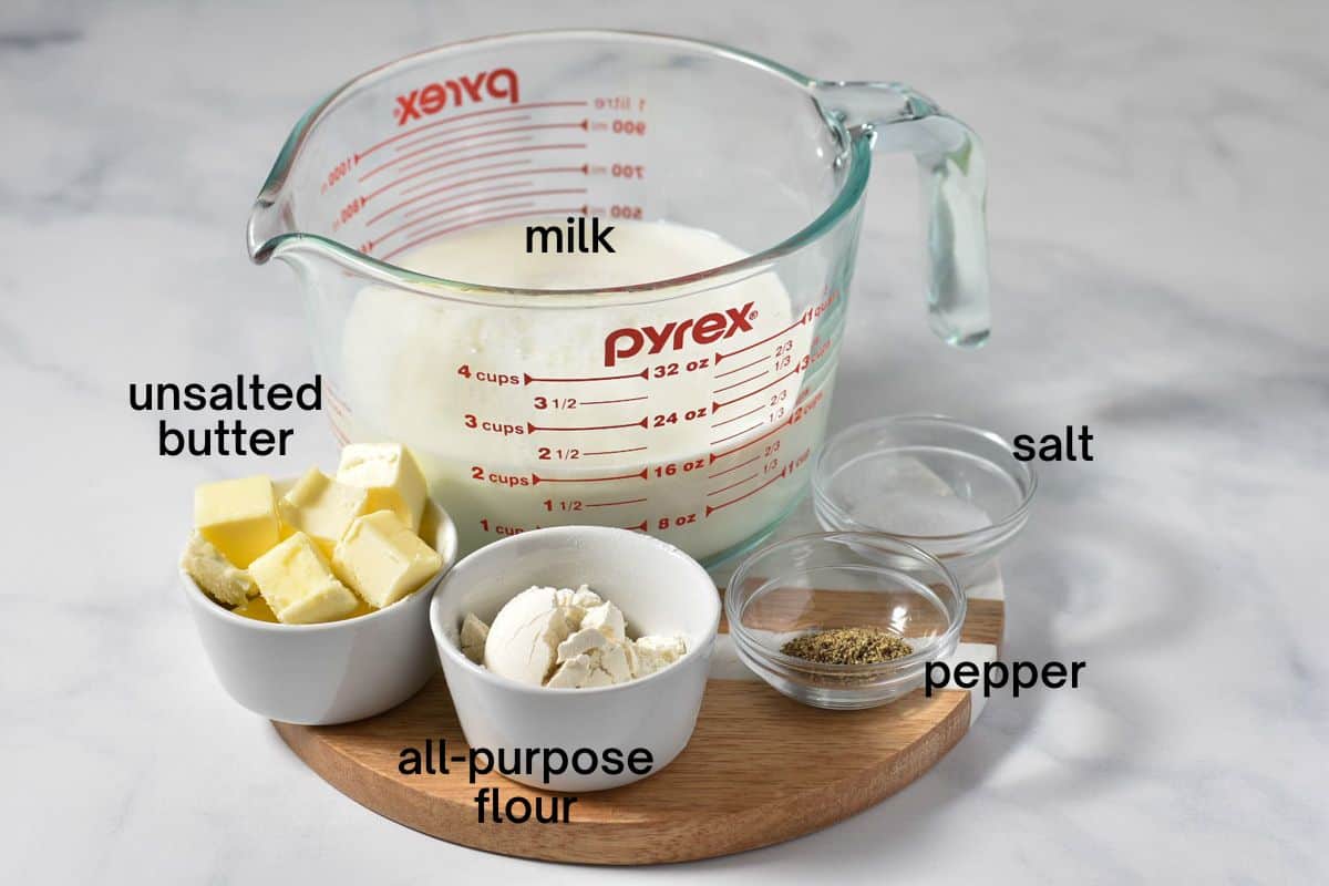 premeasured ingredients on counter for white sauce.