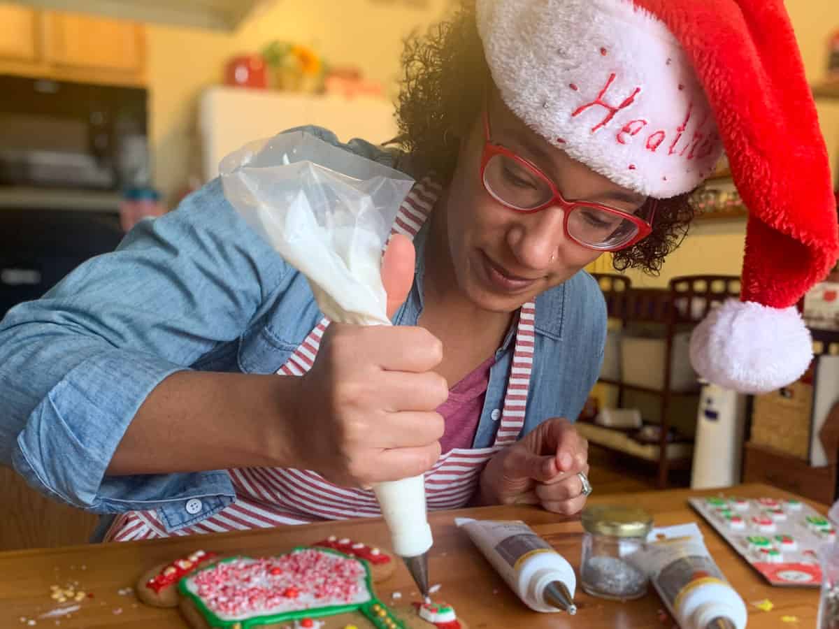 heather decorating a cookie.