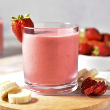 strawberry banana smoothie in a glass.