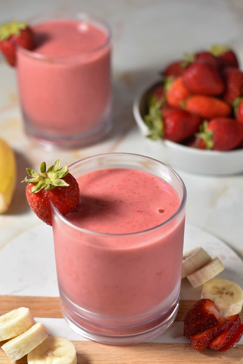 strawberry and banana smoothie in a cup. 