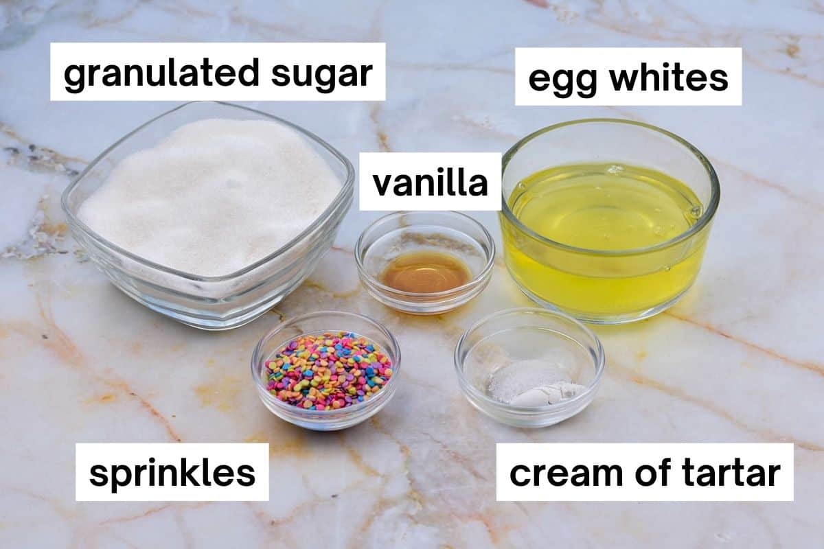 ingredients for meringue pops measured and labeled on the counter.