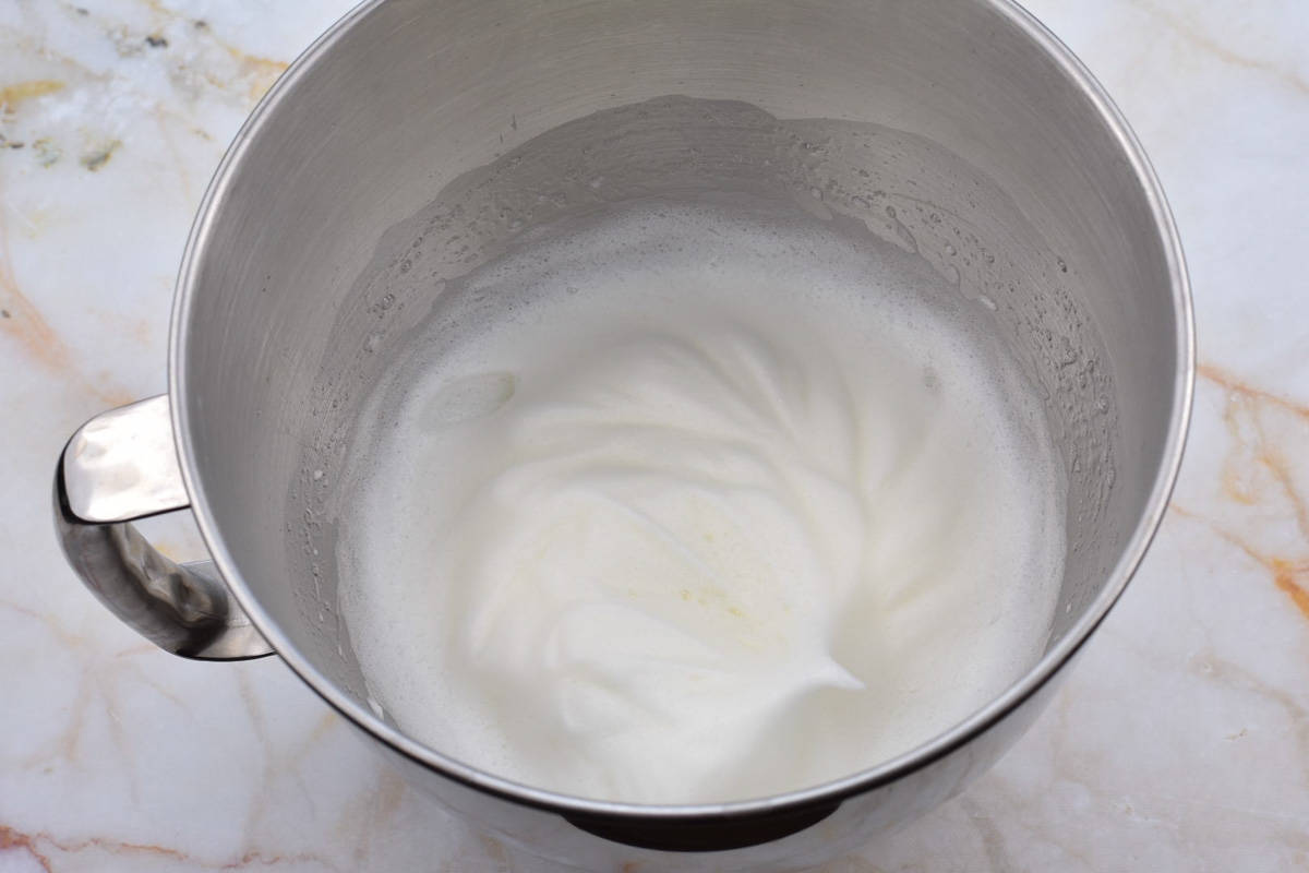 egg whites beaten to soft and fluffy peaks. 