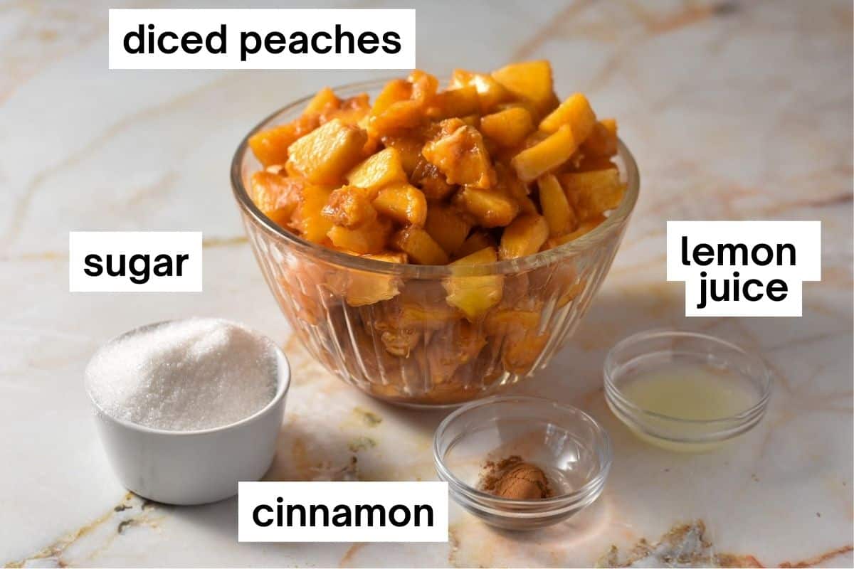 ingredients for peach compote measured and labeled on a counter. 