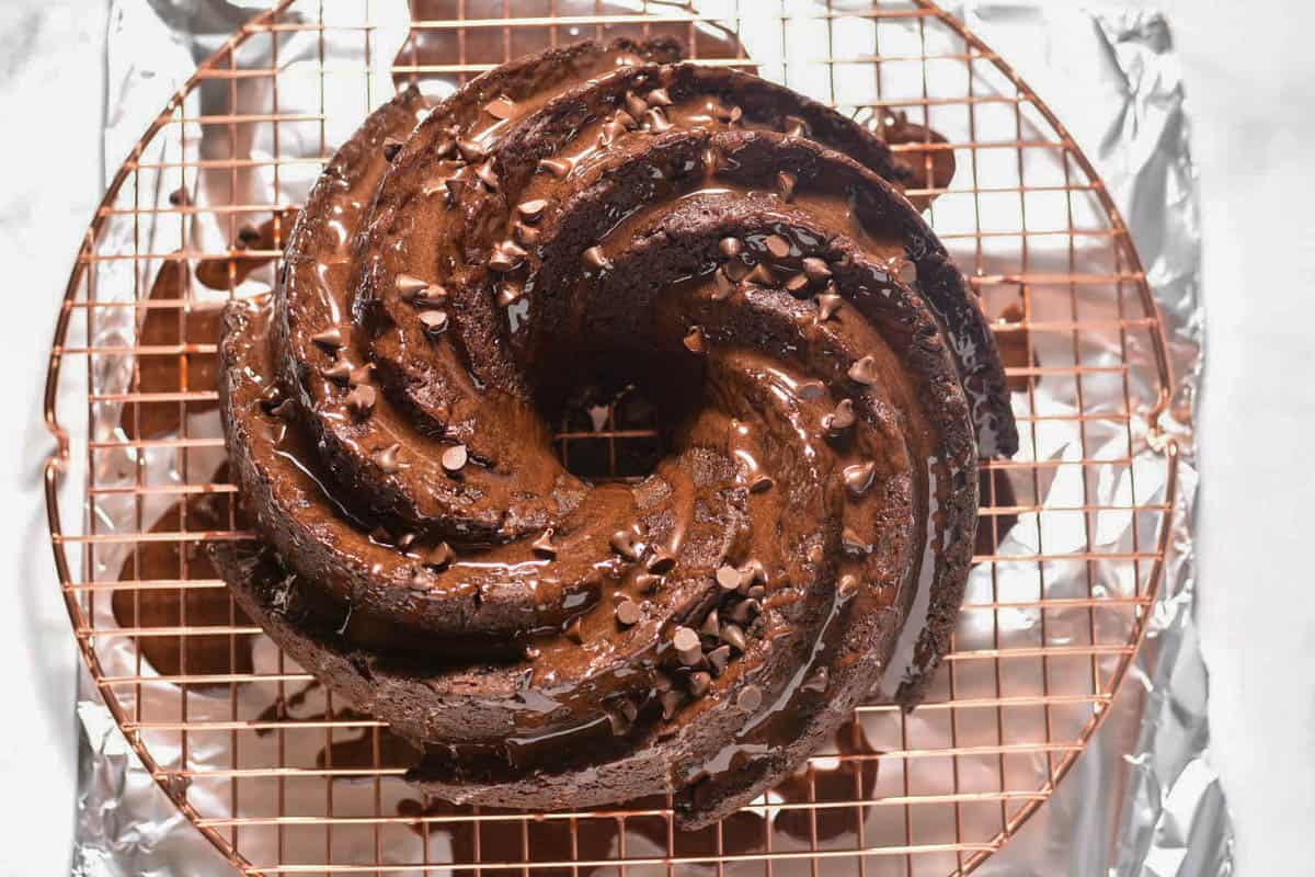 chocolate bundt cake with mini chocolate chips and frosting. 