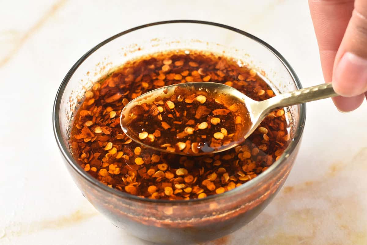spoon of bulgogi sauce with oil an pepper flakes. 