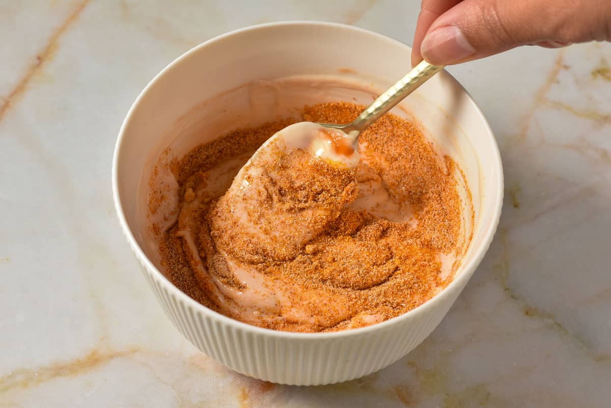 mayo and ketchup mixture and spice blend combined in a bowl. 