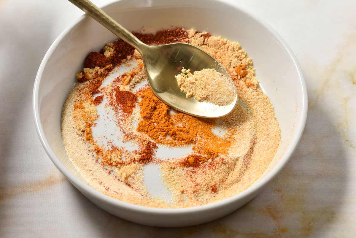 spices mixed together in a bowl. 
