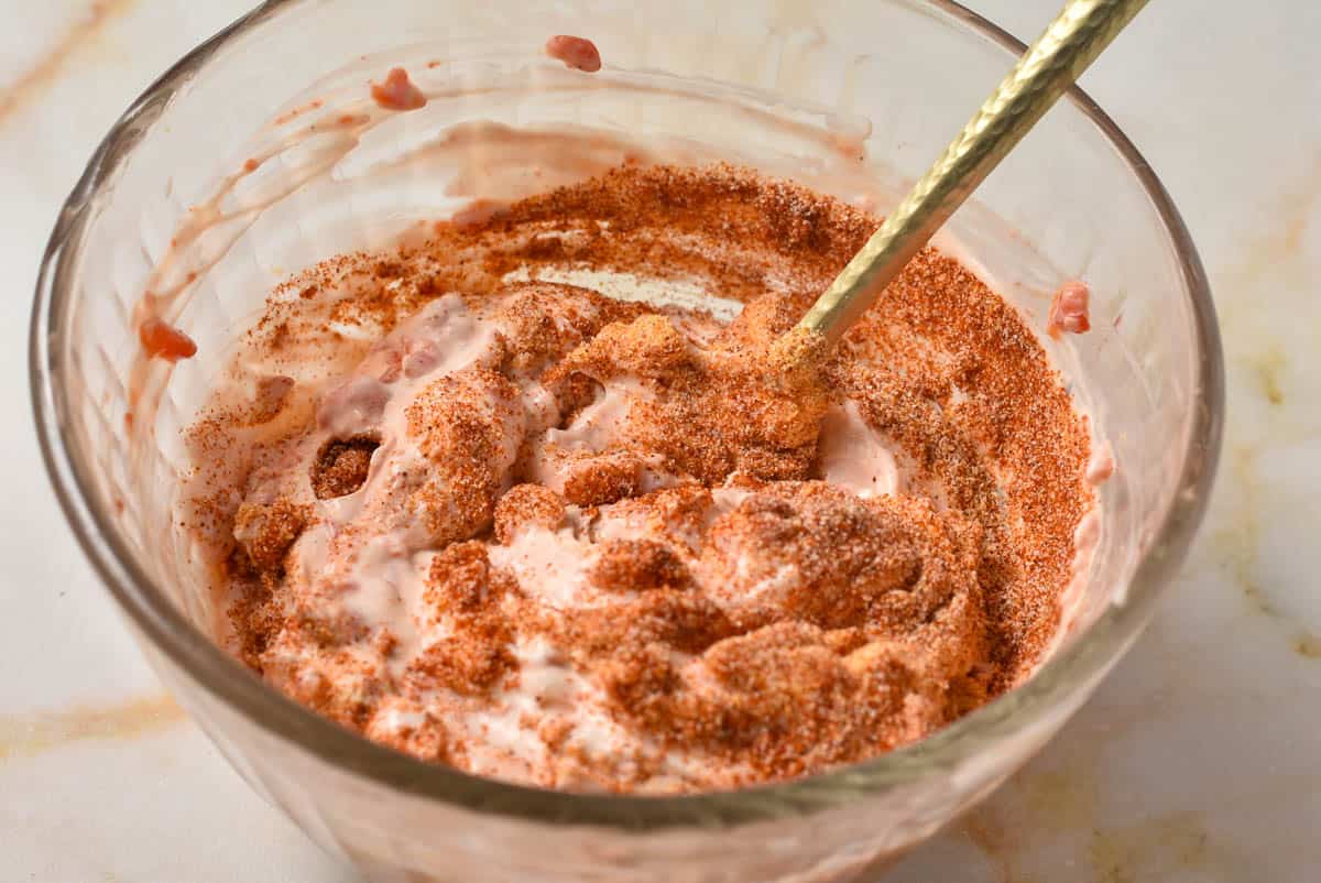sour cream mixture with spice blend in mixing bowl. 