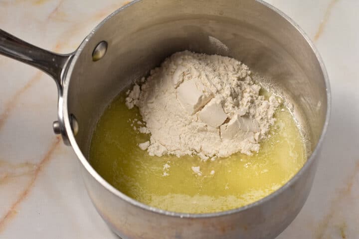 flour and melted butter together in a pot.