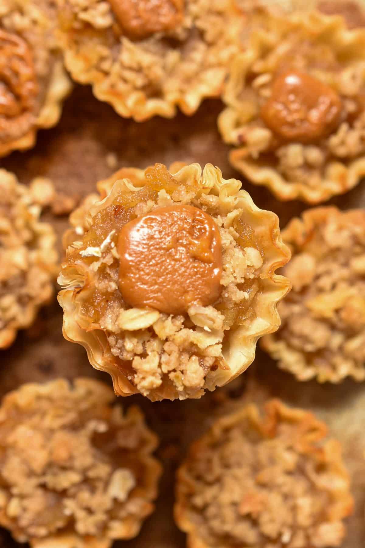 phyllo shell apple cup with caramel on the top.