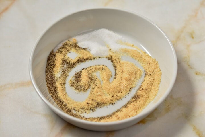spices in a shallow white bowl mixed together.