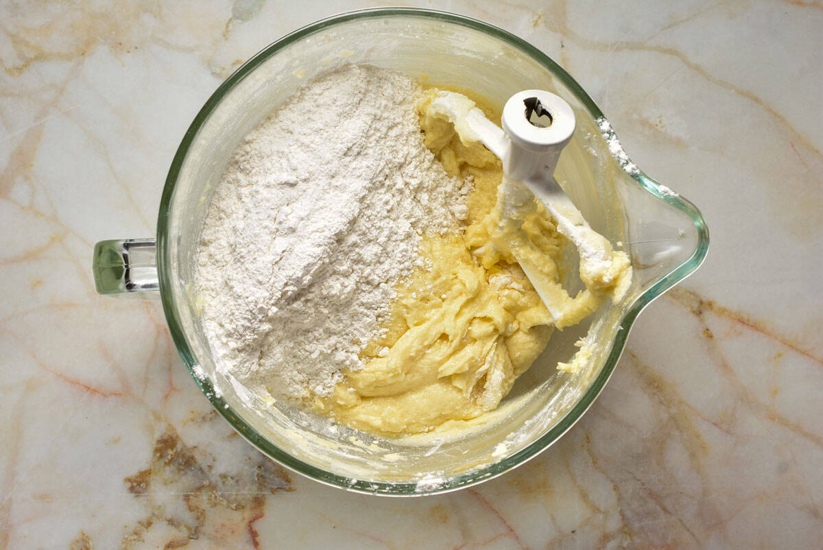 batter with flour added to mixing bowl.