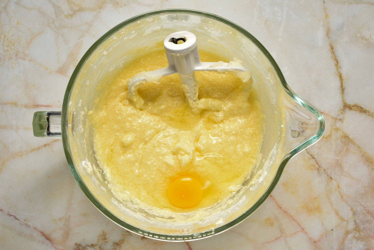 mixing bowl with butter and sugar creamed with eggs.