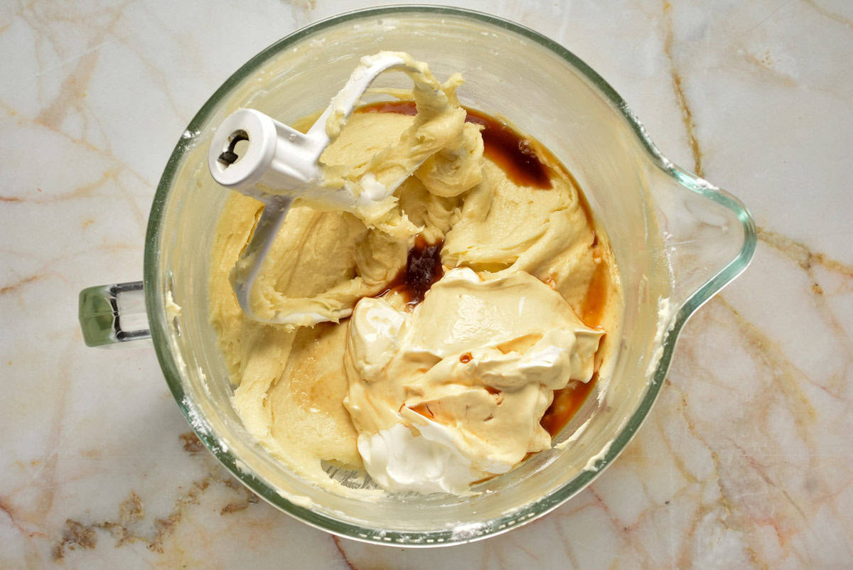 batter with sour cream and vanilla extract added.