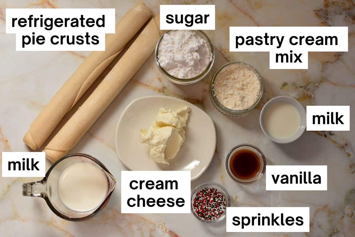 Ingredients for McDonalds holiday pie, including: refrigerated pie crusts, cream cheese, milk, pastry cream mix, and sprinkles.